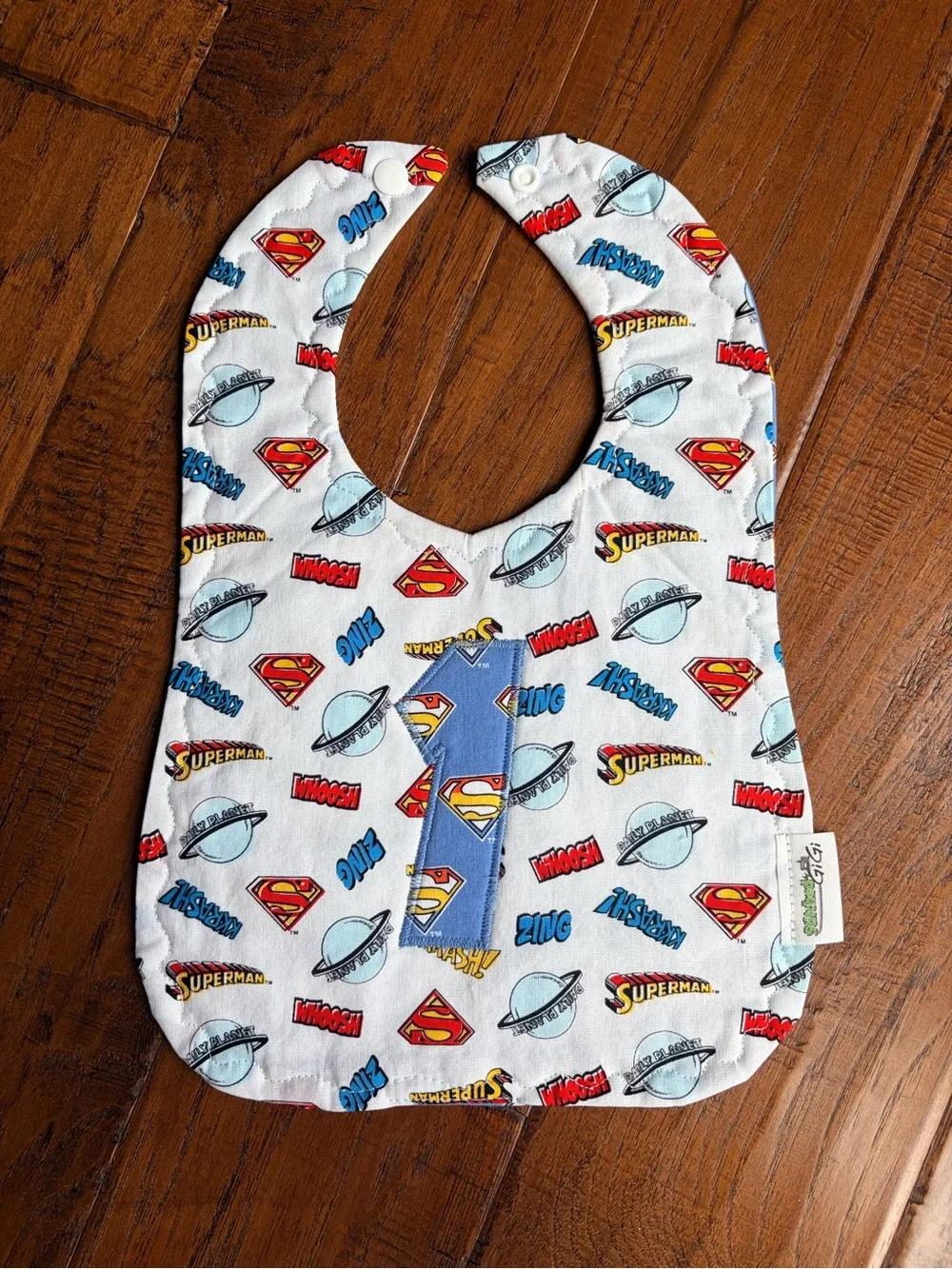 DC Comics Superman White Bib with Blue and Red Accents